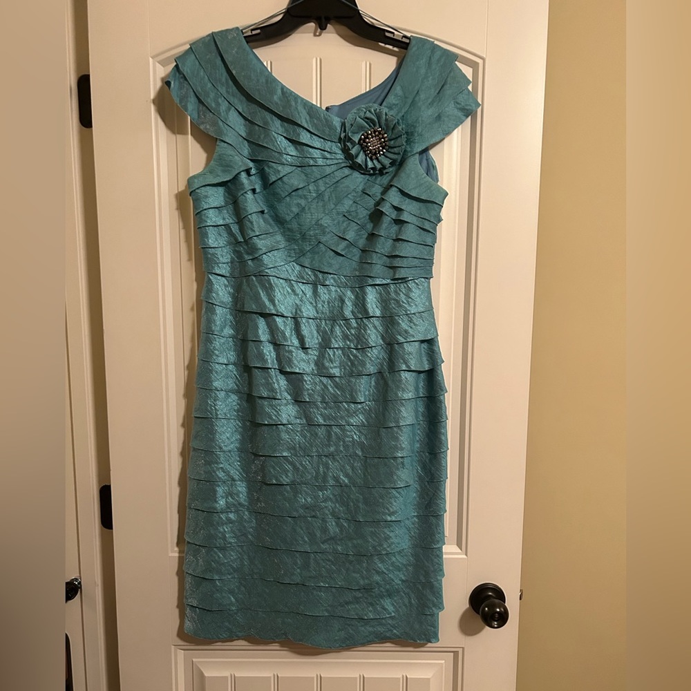 Cocktail dress worn one time.   Smoke free and pet free home.   Size 14